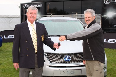 Dave lang being presented with the keys to his brand new Lexus RX450